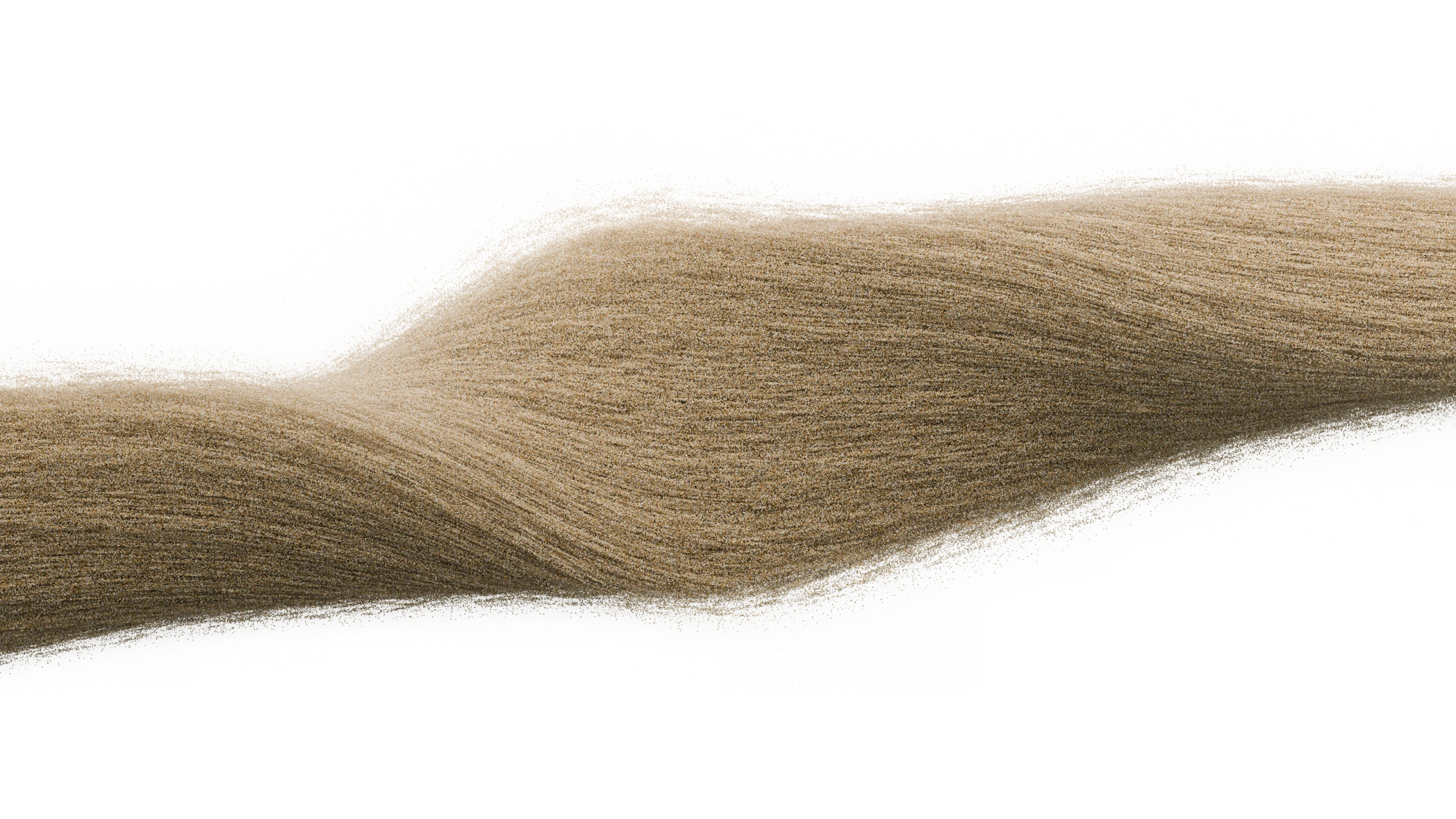 A broad stream of fine dry granules twisting along its length